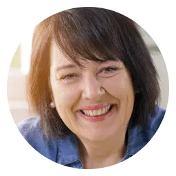 Denise from Kansas smiling, representing a verified GLPro user who achieved balance and peace of mind.